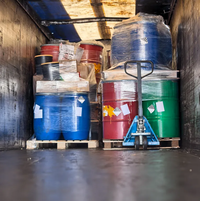 Properly labeled drums filled with pharmaceutical waste at Ind-Swift facility, ensuring compliant and safe hazardous waste disposal.