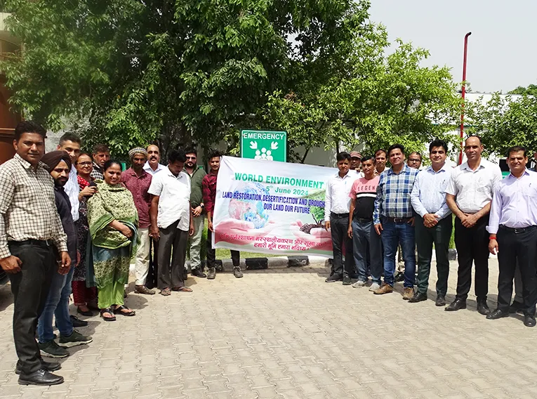 Ind-Swift employees celebrating Environment Day by planting saplings as part of green initiative and sustainability efforts.